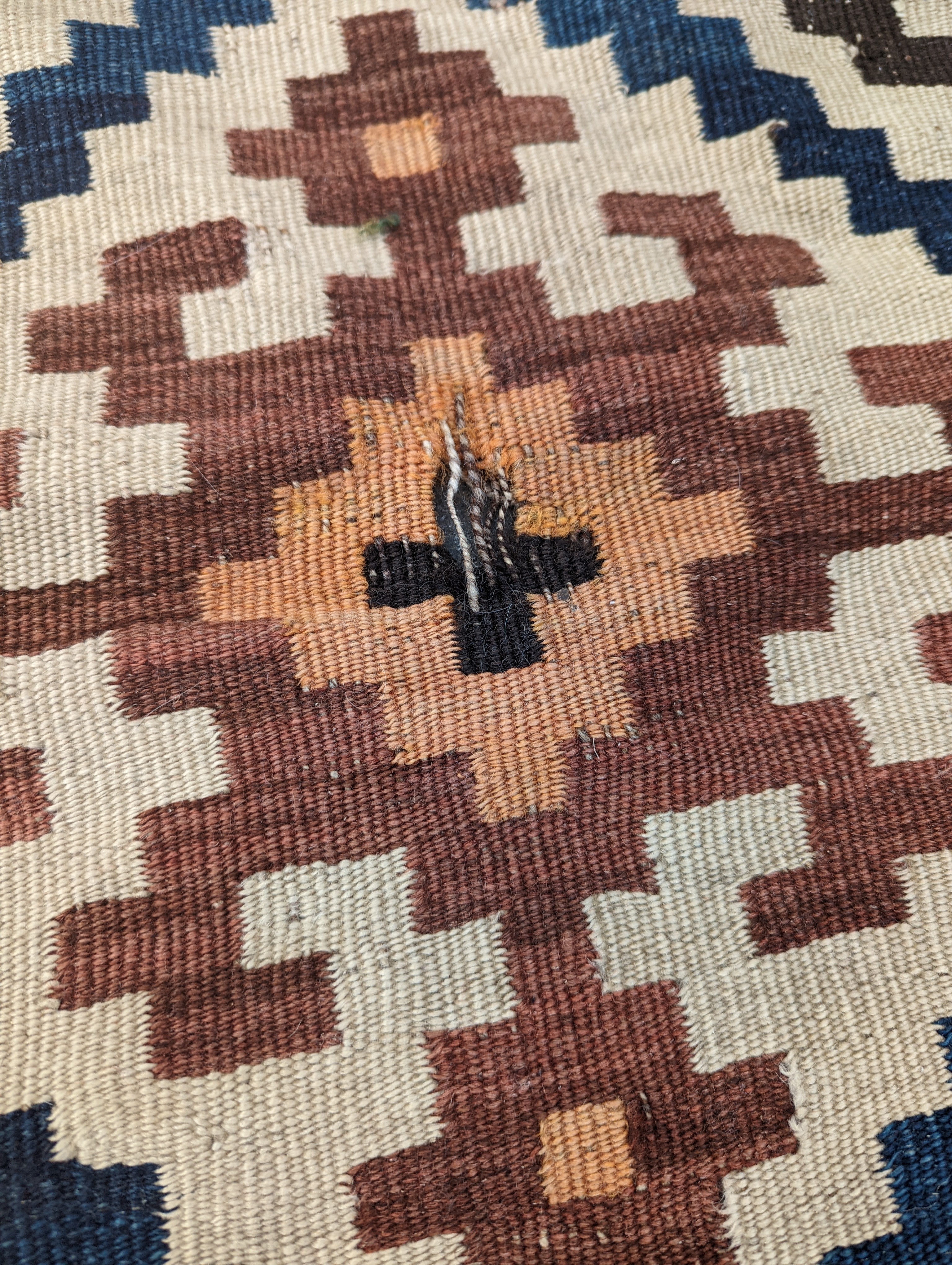 A Persian tribal Kelim carpet, 230 x 158cm and a Turkish bag